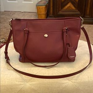 Leather Coach computer bag. 17”x11”, deep Fuchsia in color.